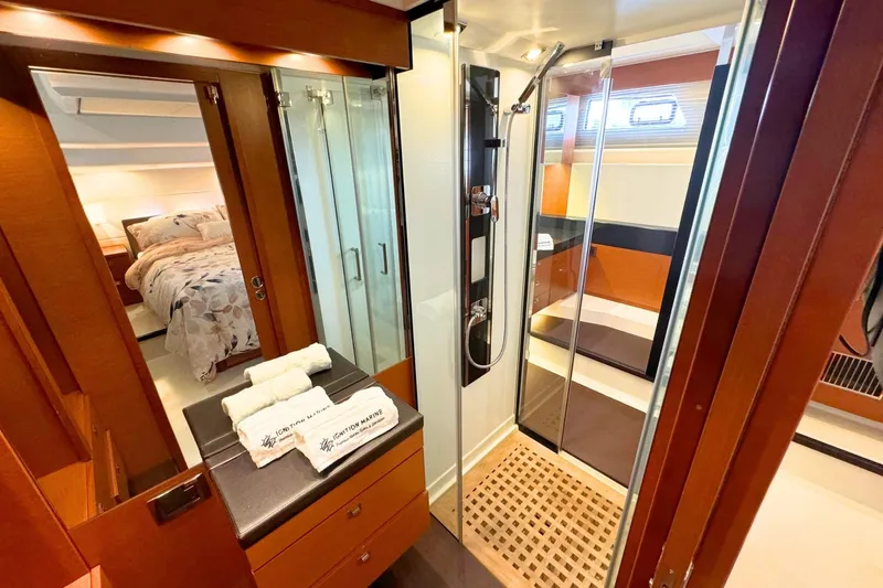 Luna Maris Yacht Photos Pics Luxurious 2016 Prestige 550 yacht interior with elegant bedroom and modern bathroom.