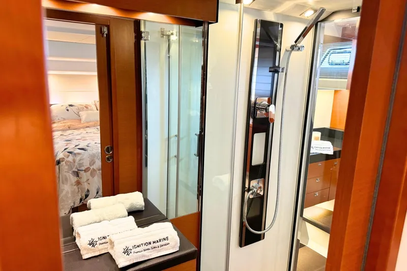 Luna Maris Yacht Photos Pics Luxurious bathroom and bedroom interior of a 2016 Prestige 550 yacht.