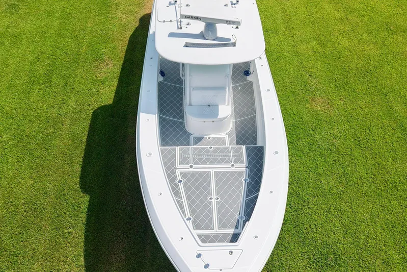  Yacht Photos Pics Aerial view of 2005 Venture 39 Open boat on grass, showcasing deck layout.