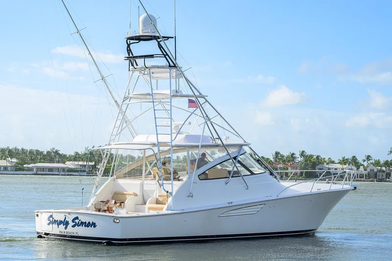  Yacht Photos Pics 2015 Viking 52 Open yacht cruising near Palm Beach, Florida, under clear skies.