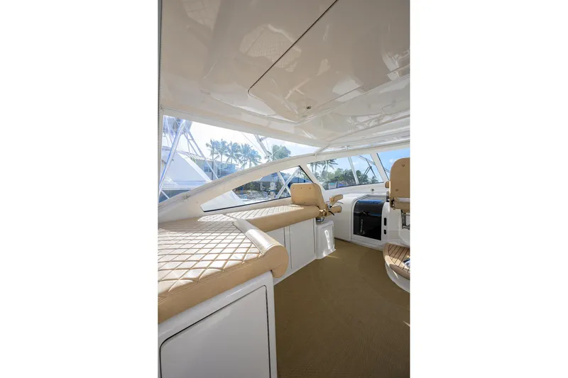 Yacht Photos Pics Interior of 2015 Viking 52 Open yacht with beige seating and modern design.