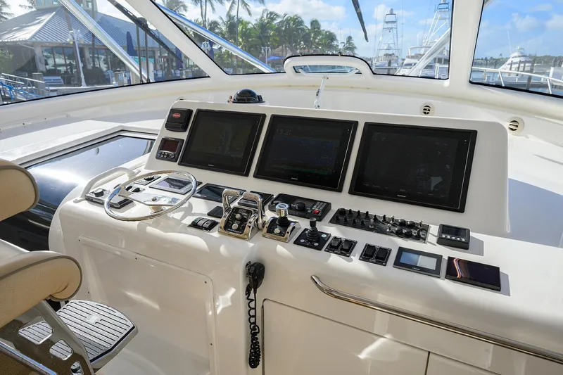  Yacht Photos Pics Helm of 2015 Viking 52 Open yacht with advanced navigation controls and displays.