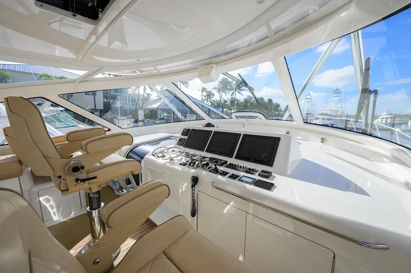  Yacht Photos Pics Interior helm of 2015 Viking 52 Open yacht with modern navigation equipment.