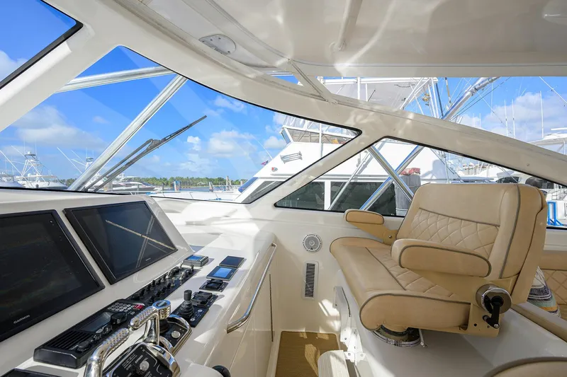  Yacht Photos Pics Interior of 2015 Viking 52 Open yacht with luxurious helm and navigation equipment.