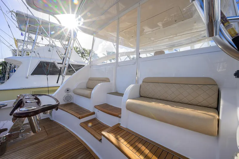 Yacht Photos Pics Luxurious 2015 Viking 52 Open yacht with elegant seating and teak flooring.