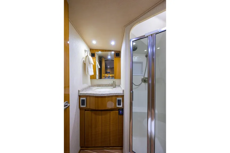  Yacht Photos Pics Luxurious bathroom in 2015 Viking 52 Open yacht with modern shower and vanity.