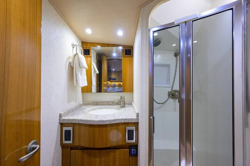  Yacht Photos Pics 2015 Viking 52 Open yacht bathroom with modern shower and vanity.