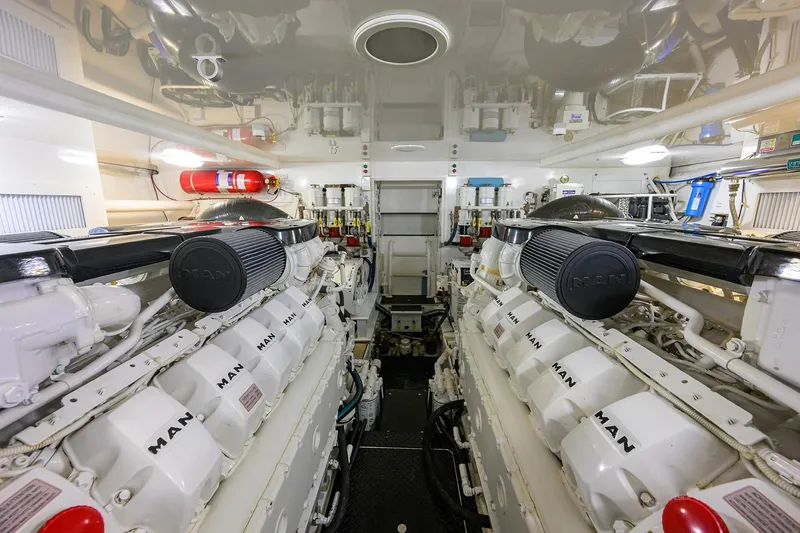  Yacht Photos Pics Engine room of 2015 Viking 52 Open yacht with MAN engines and fire safety equipment.