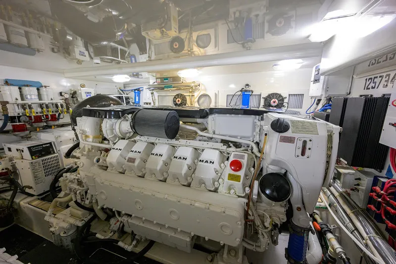  Yacht Photos Pics Engine room of a 2015 Viking 52 Open yacht, featuring a MAN engine.