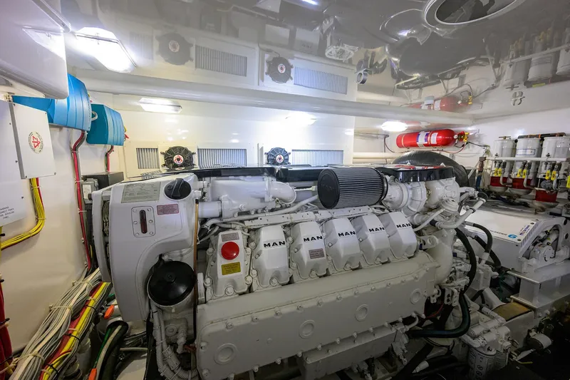  Yacht Photos Pics Engine room of a 2015 Viking 52 Open yacht, featuring a MAN engine.