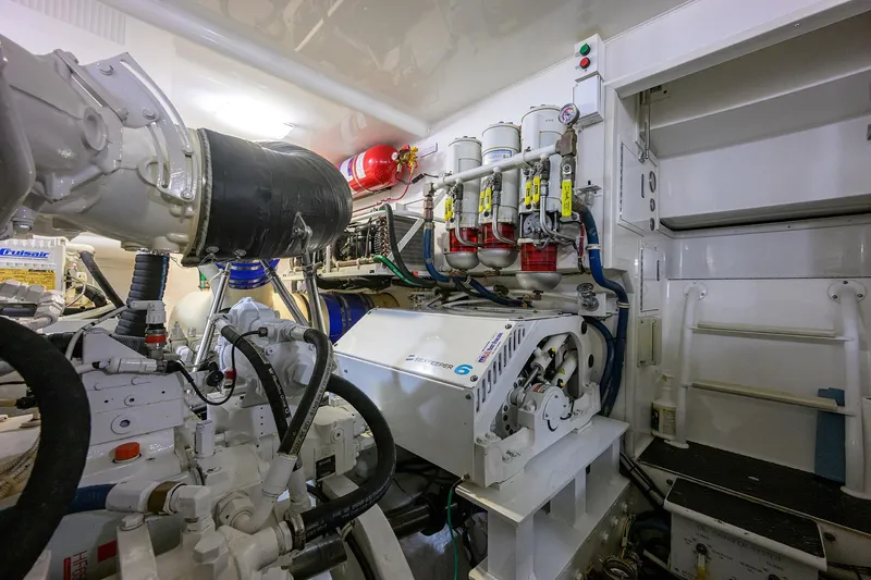  Yacht Photos Pics Engine room of 2015 Viking 52 Open yacht, showcasing mechanical components and systems.