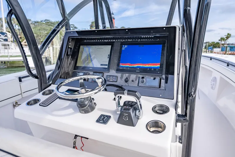  Yacht Photos Pics 2020 SeaHunter 35 Tournament boat console with dual displays and steering wheel.