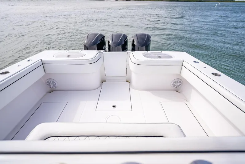 Yacht Photos Pics 2020 SeaHunter 35 Tournament boat stern with triple outboard motors.