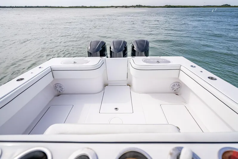  Yacht Photos Pics 2020 SeaHunter 35 Tournament boat with triple outboard motors on the water.