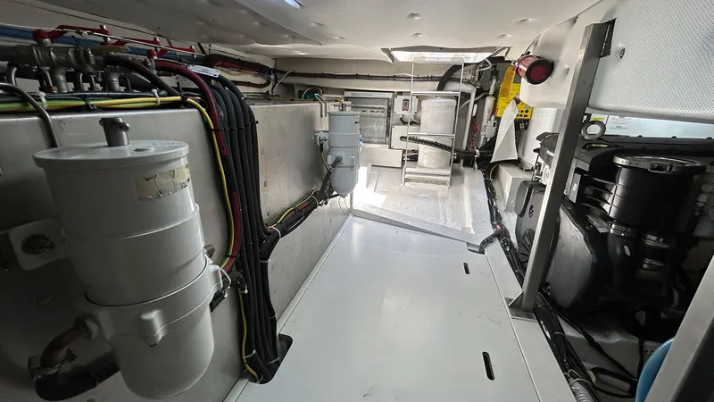  Yacht Photos Pics Engine room of 2022 Solaris Power 44 yacht, showcasing mechanical components and wiring.