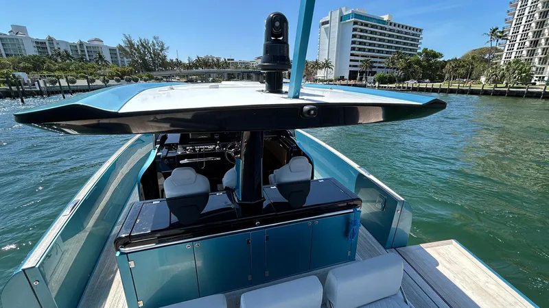  Yacht Photos Pics 2022 Solaris Power 44 yacht on water, modern design, cityscape background.