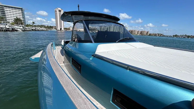  Yacht Photos Pics 2022 Solaris Power 44 yacht on water, sleek design, blue exterior, sunny day.