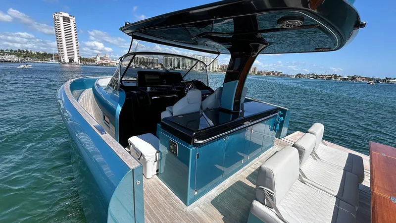  Yacht Photos Pics 2022 Solaris Power 44 yacht on water, featuring sleek design and luxurious seating.