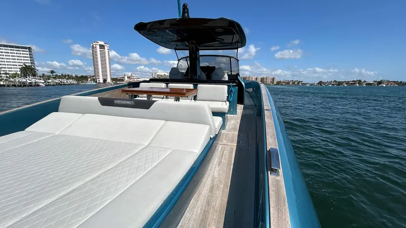  Yacht Photos Pics 2022 Solaris Power 44 yacht on water, featuring sleek design and luxurious seating.