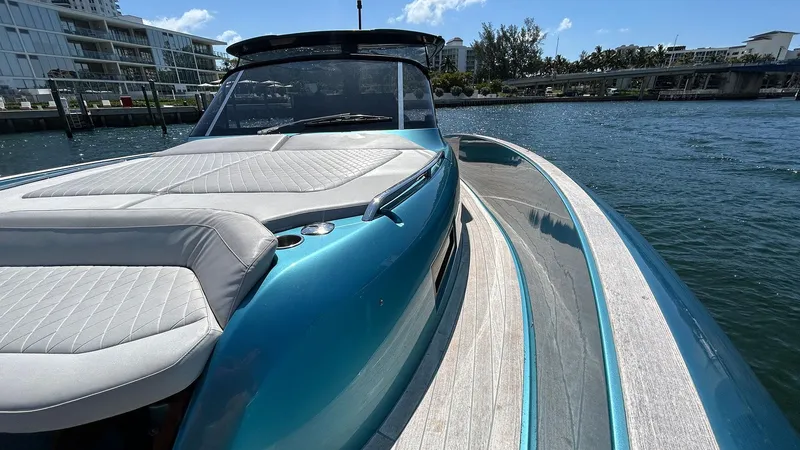  Yacht Photos Pics 2022 Solaris Power 44 yacht with sleek design on calm water.