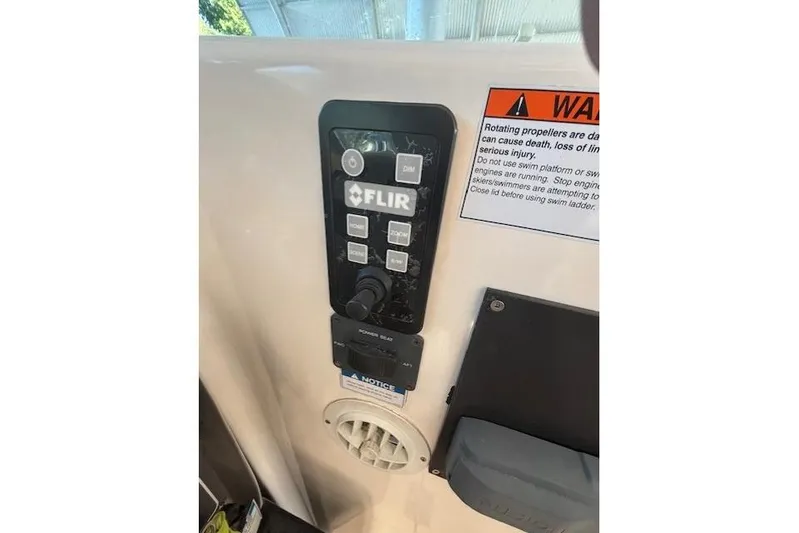 The Riddler Yacht Photos Pics Control panel on 2009 Tiara Yachts 3600 Open with FLIR system and safety warning.