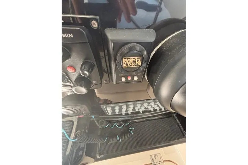The Riddler Yacht Photos Pics Control panel of a 2009 Tiara Yachts 3600 Open with ACR and Garmin equipment.