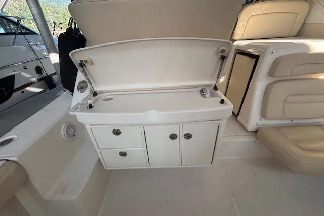 The Riddler Yacht Photos Pics 2009 Tiara Yachts 3600 Open interior with storage compartments and seating.