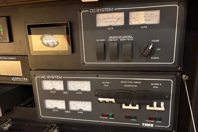 The Riddler Yacht Photos Pics Electrical control panel of a 2009 Tiara Yachts 3600 Open, featuring DC and AC systems.