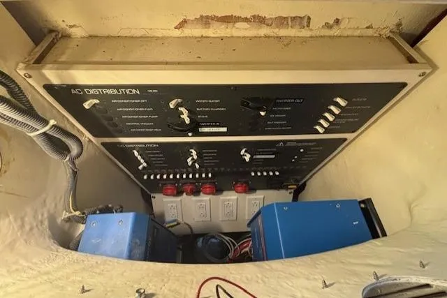 The Riddler Yacht Photos Pics Electrical panel of a 2009 Tiara Yachts 3600 Open, featuring AC distribution controls.