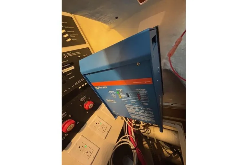 The Riddler Yacht Photos Pics Electrical panel inside 2009 Tiara Yachts 3600 Open, featuring inverter and wiring.