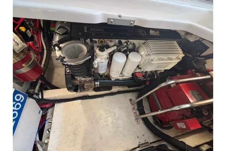 The Riddler Yacht Photos Pics Engine compartment of a 2009 Tiara Yachts 3600 Open, showcasing detailed components and layout.
