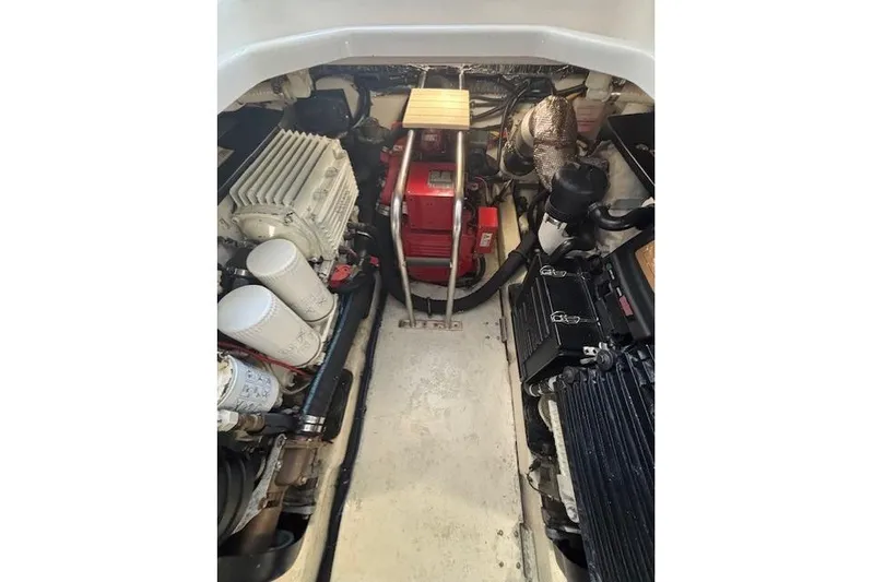 The Riddler Yacht Photos Pics Engine compartment of a 2009 Tiara Yachts 3600 Open, showcasing mechanical components.