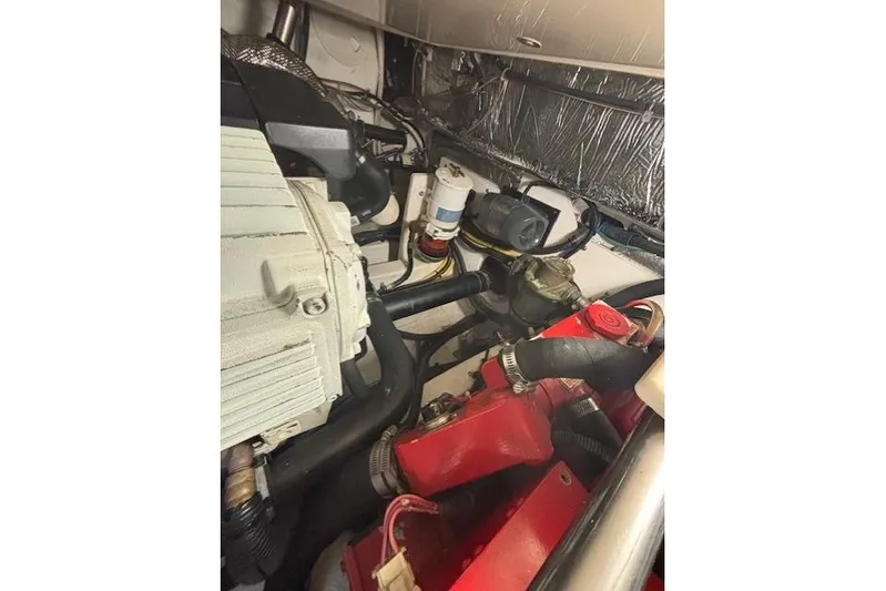 The Riddler Yacht Photos Pics Engine compartment of 2009 Tiara Yachts 3600 Open, showcasing mechanical components.