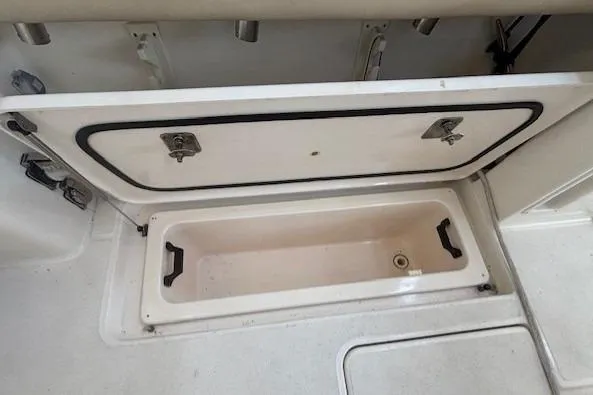 The Riddler Yacht Photos Pics Open storage compartment on a 2009 Tiara Yachts 3600 Open boat.