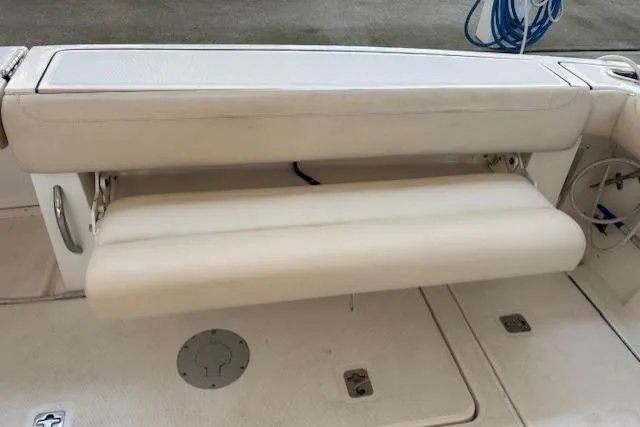 The Riddler Yacht Photos Pics 2009 Tiara Yachts 3600 Open boat seating area with foldable bench.