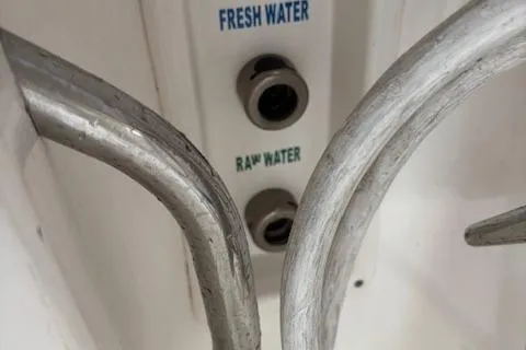 The Riddler Yacht Photos Pics 2009 Tiara Yachts 3600 Open water connections labeled "Fresh Water" and "Raw Water".