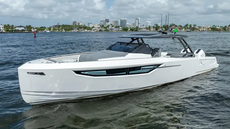  Yacht Photos Pics Sleek 2025 Limitless Seas XLV 45 yacht cruising on a sunny day.