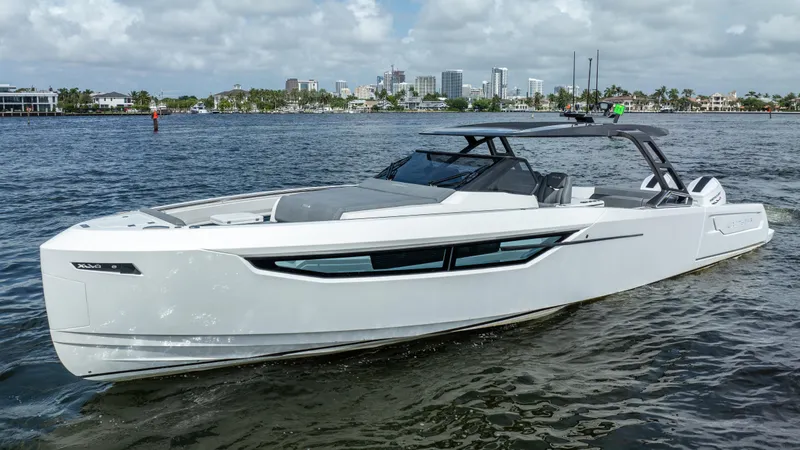  Yacht Photos Pics Sleek 2025 Limitless Seas XLV 45 yacht cruising on a sunny day.