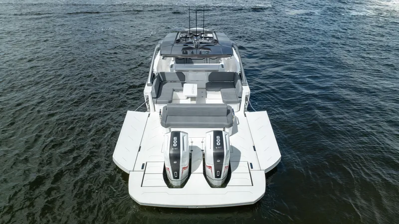  Yacht Photos Pics 2025 Limitless Seas XLV 45 boat with dual engines on open water.