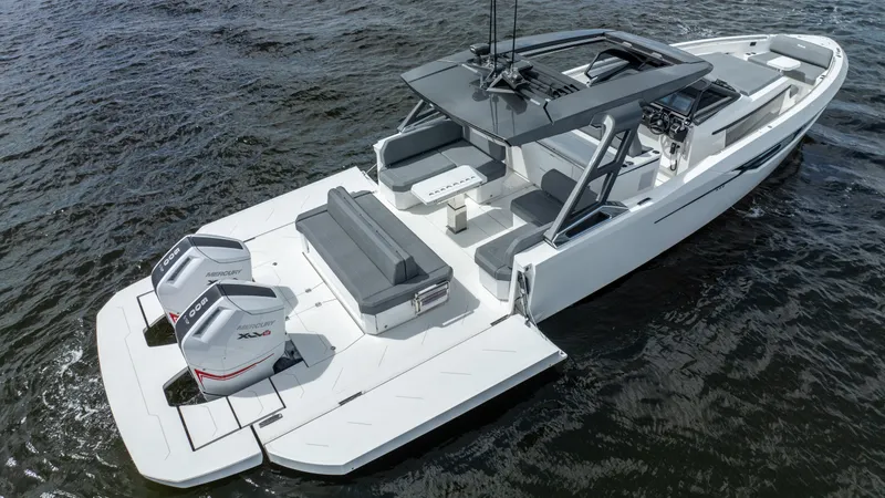  Yacht Photos Pics 2025 Limitless Seas XLV 45 boat on water, featuring dual outboard engines and sleek design.