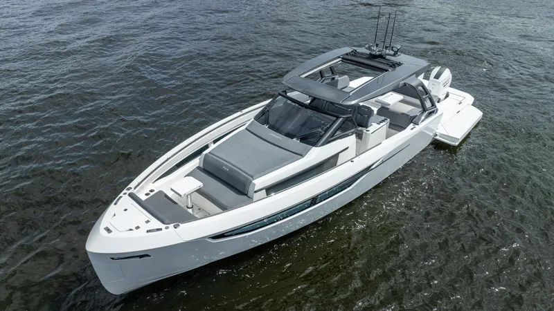  Yacht Photos Pics Sleek 2025 Limitless Seas XLV 45 yacht cruising on open water.