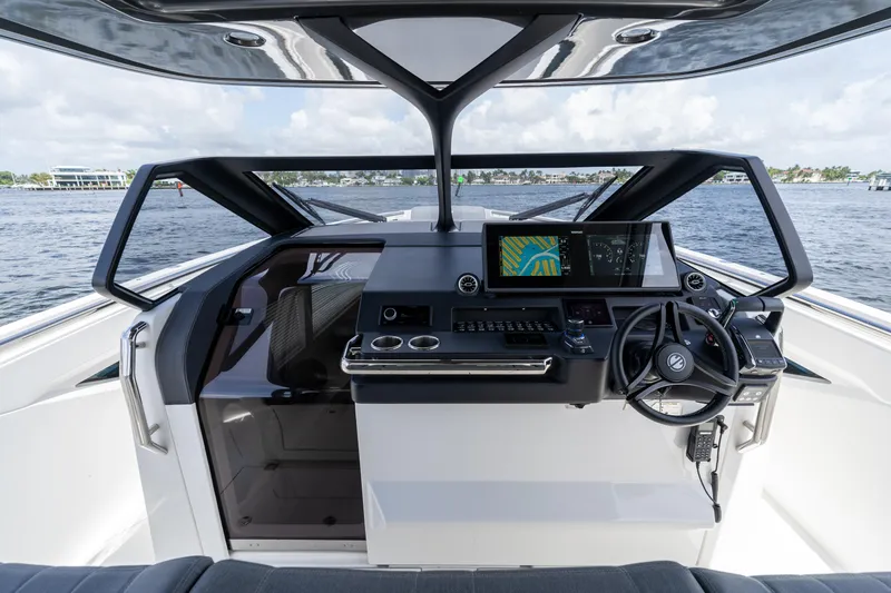  Yacht Photos Pics Modern Limitless Seas XLV 45 yacht cockpit, 2025 model, with advanced navigation systems.
