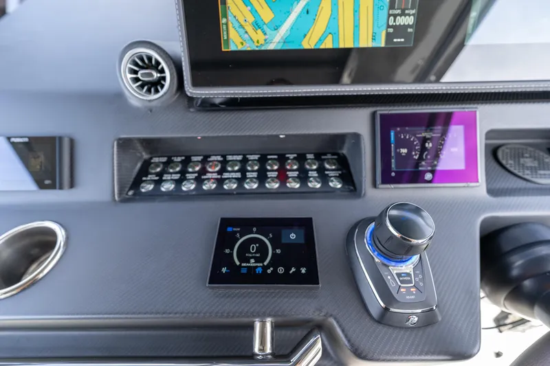  Yacht Photos Pics Control panel of Limitless Seas XLV 45 yacht, featuring advanced navigation and control systems, 2025 model.