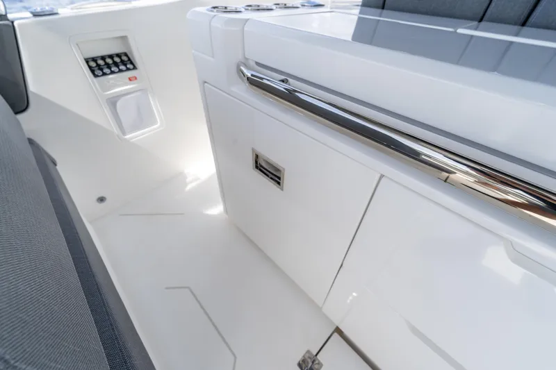  Yacht Photos Pics Interior of Limitless Seas XLV 45 yacht, featuring sleek white cabinetry and modern design, 2025 model.