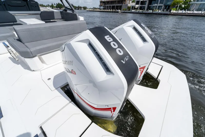  Yacht Photos Pics Limitless Seas XLV 45 boat with dual 600 V12 engines on a sunny day.