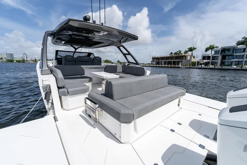  Yacht Photos Pics Luxurious Limitless Seas XLV 45 yacht, 2025 model, featuring spacious seating and sleek design on open water.