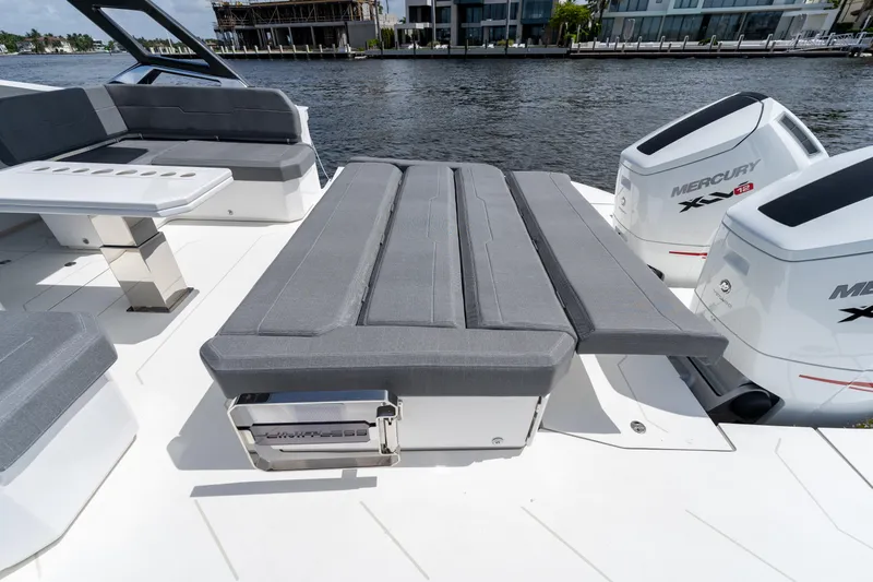  Yacht Photos Pics Luxury Limitless Seas XLV 45 yacht deck with seating, 2025 model, featuring twin Mercury engines.