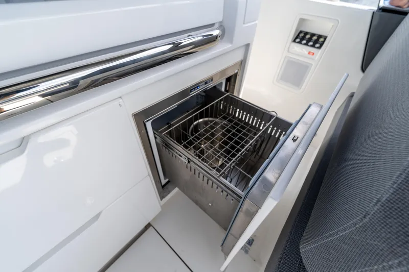  Yacht Photos Pics Luxury yacht kitchen with open stainless steel dishwasher, Limitless Seas XLV 45, 2025 model.