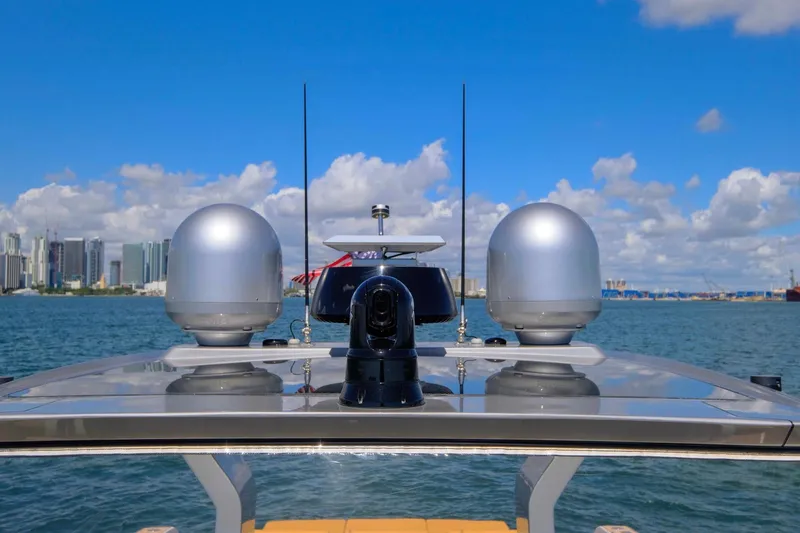 Seaduction Yacht Photos Pics 2023 Pardo Yachts 43 with advanced navigation equipment, city skyline in background.