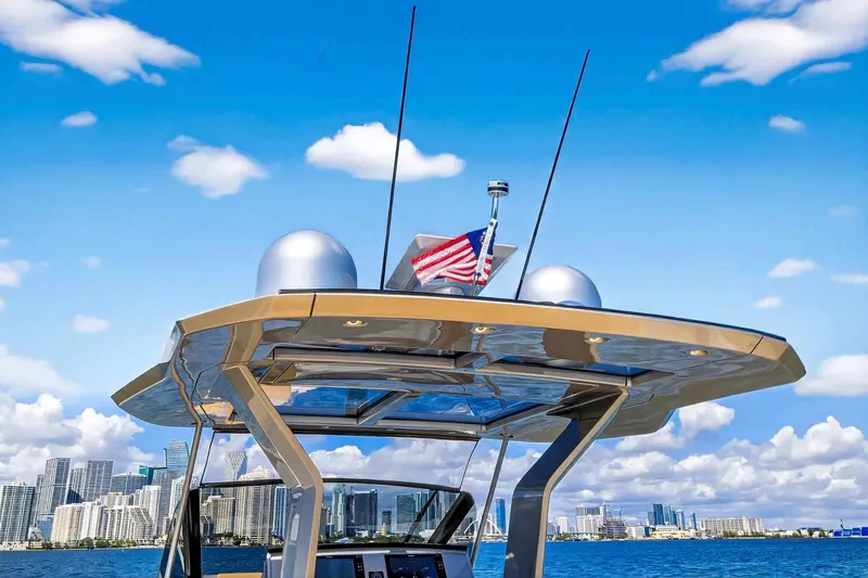 Seaduction Yacht Photos Pics 2023 Pardo Yachts 43 with city skyline and American flag in background.